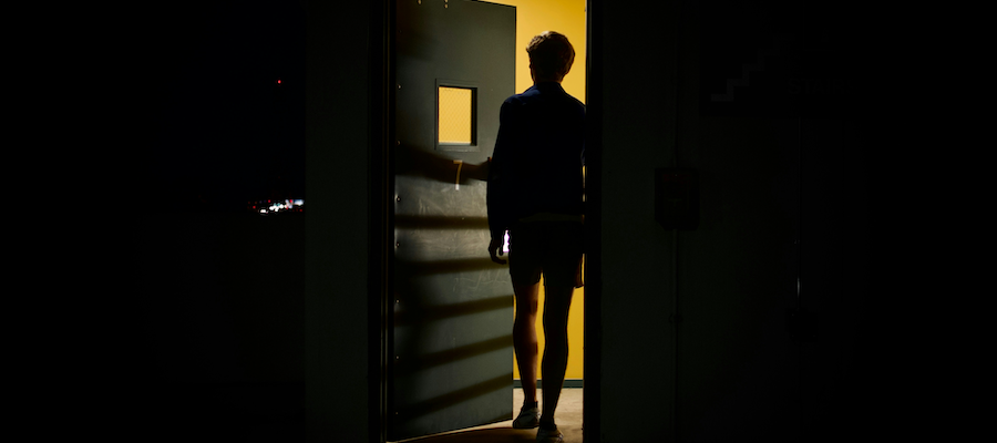 ominous door opened with dark silhouette